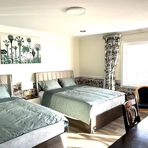 Master Bedroom With Two Queen Sized Bed